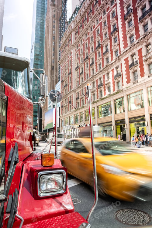 Preview: Vintage red truck on a bustling Manhattan street