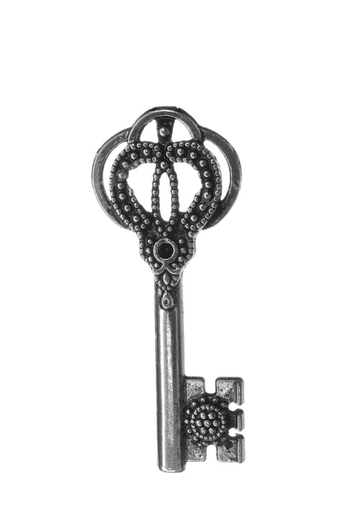Preview: Steel vintage ornate key on white background