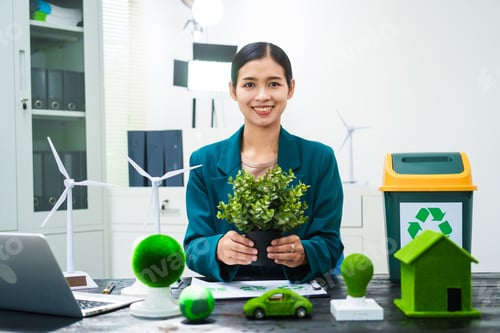 Preview: An Asian businesswoman sits at her desk, discussing clean energy solutions their impact on homes