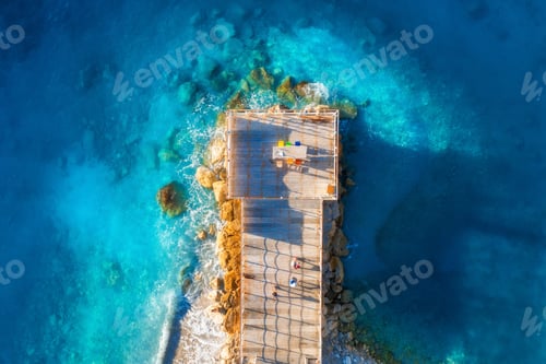 Preview: Aerial view of beautiful wooden pier, sea bay, sandy beach