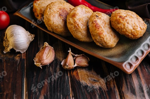 Preview: Delicious homemade cutlets on plate top view