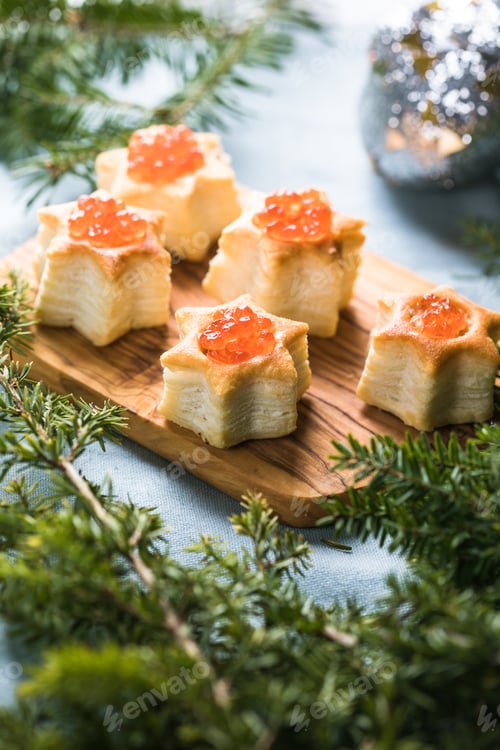 Preview: Christmas tree canape or sandwich with cucumber slice, salmon for festive x-mas snack. New year