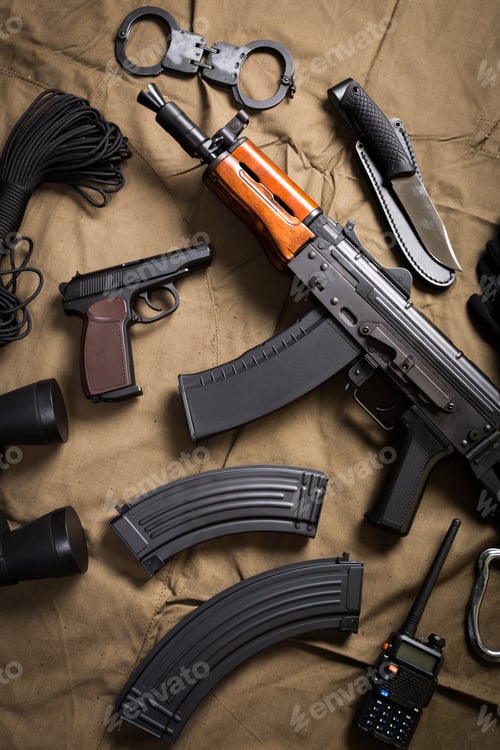 Preview: Items used for security and law enforcement, displayed on a brown cloth background