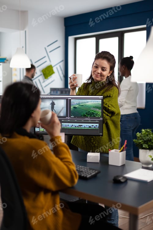 Preview: Women videographers editing video project creating multimedia content