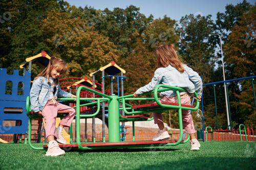 Preview: Autumn season. Kids are having fun on the playground