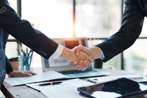 Preview: Business people shaking hand to agree to enter into a joint venture agreement to do business