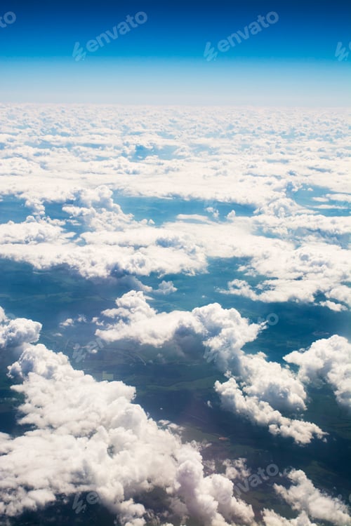 Preview: Blue sky with fluffy white clouds