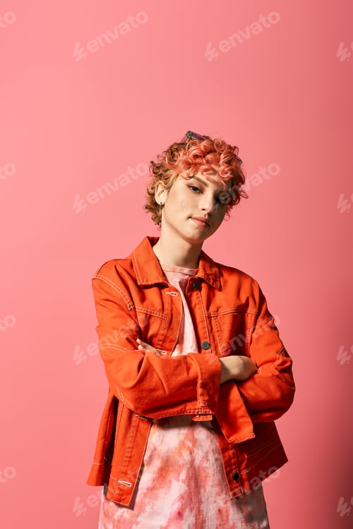 Preview: Radiant Redhead Posing Against Pink Wall