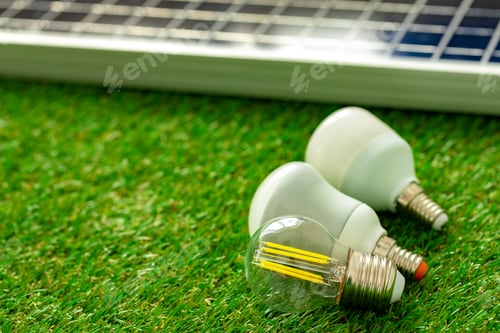 Preview: Solar energy panel and light bulb, green energy