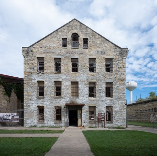 Preview: a brick building with a glass tower on the top of it