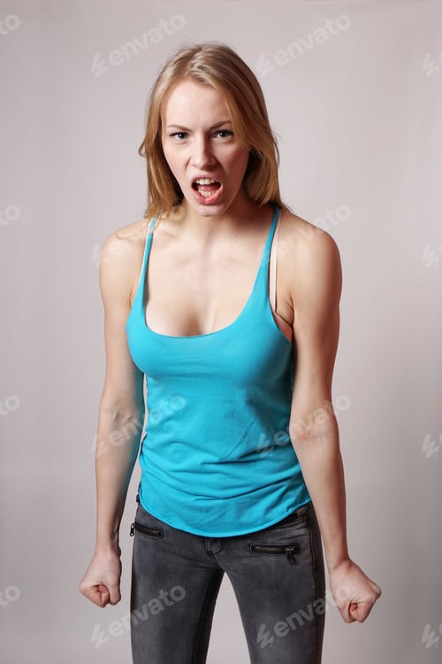 Preview: angry woman with clenched fist