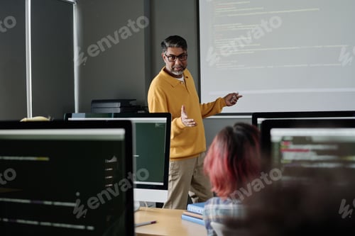 Preview: Mature Teacher Speaking About Code