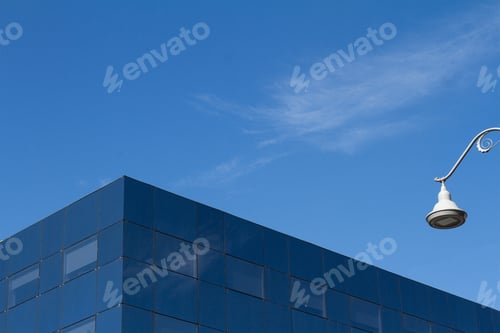 Preview: Glass city office building detail with blue sky