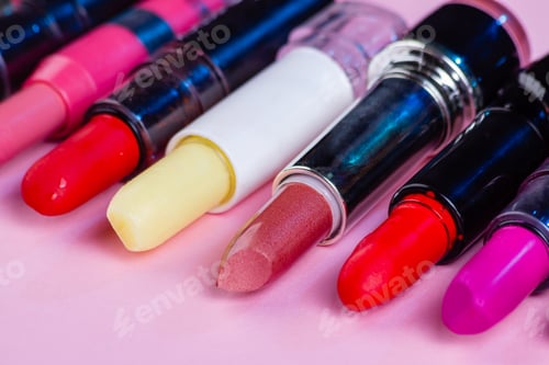 Preview: Close up set of various multicolored lipsticks.