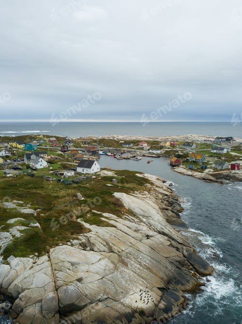 Preview: Aerial view of a small town near a rocky coast on the Atlantic Ocean