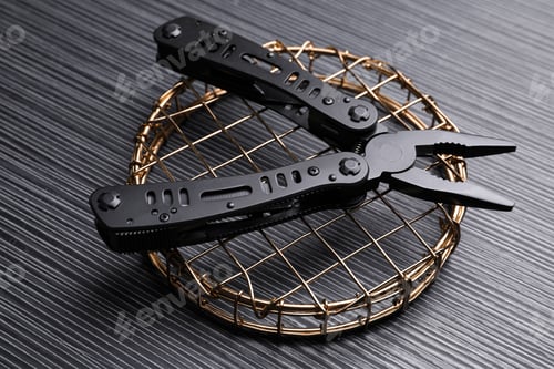 Preview: Modern compact portable multitool on black wooden table