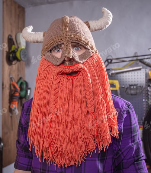 Preview: Halloween and carnival concept - a brutal viking in a mask