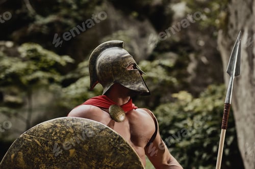 Preview: Gladiator in helmet posing with arms