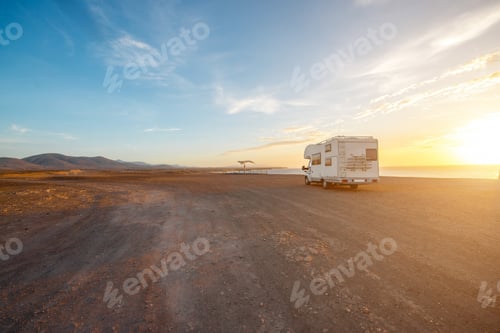Preview: Deserted landscape with camping vehicle