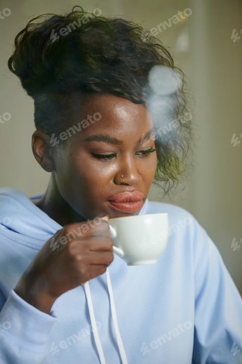 Preview: Pensive Woman Drinking Coffee