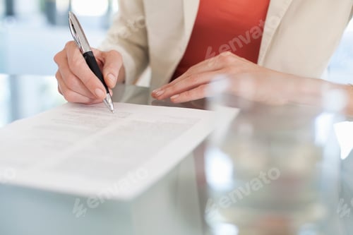 Preview: Cropped image of businesswoman signing paperwork