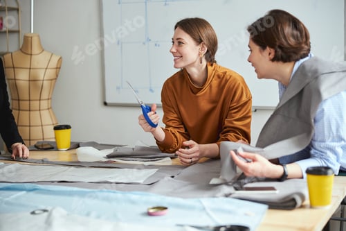 Preview: Excited female with scissors smiling to design teacher