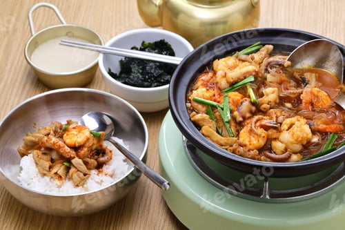Preview: Nak-Gop-Sae is a spicy soup with octopus, beef small intestine, and shrimp. Korean cuisine