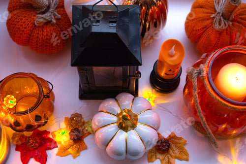 Preview: Festive decor of the house on the windowsill for Halloween - pumpkins, Jack o lanterns, skulls, cobw