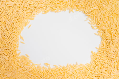 Preview: Pile of Uncooked Orzo pasta, raw dry Italian risoni isolated on white background. top view