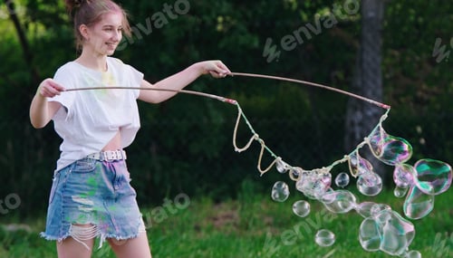 Preview: Girl Inflates Big Soap Bubbles, Outdoors Leisure