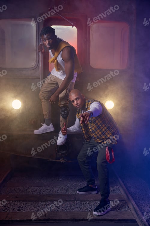 Preview: Cool young guys rappers shooting video in misty subway underground