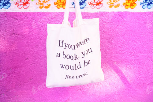 Fine Print on a Pink Textured Background