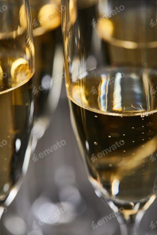 Preview: close up of sparkling wine in glasses for celebrating christmas eve
