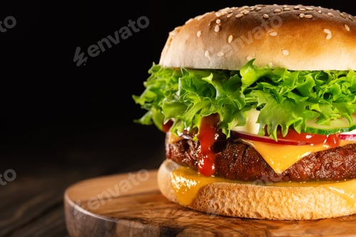 Preview: Tasty burger with smoke, fast food concept. Fresh homemade grilled hamburger with meat patty, copy