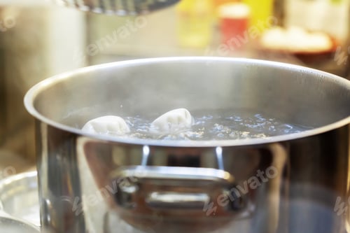 Preview: Khinkali boiling in a stainless steel cooking pot