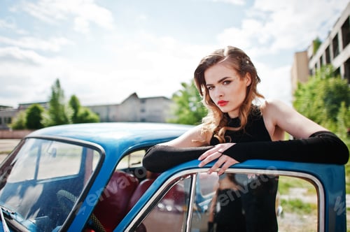 Preview: Vintage car and girl
