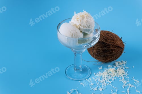 Preview: Coconut ice cream with vanilla over a blue background