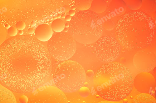 Vista previa: Fondo
colorido naranja abstracto con aceite sobre la superficie del agua. Resumen de gotas de aceite en el agua