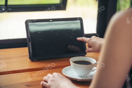 Preview: Asian woman using digital tablet shopping online call texting message internet technology
