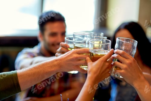 Preview: happy friends drinking beer at bar or pub