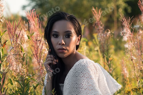 Preview: Young Asian Woman At Floral Nature Outdoors