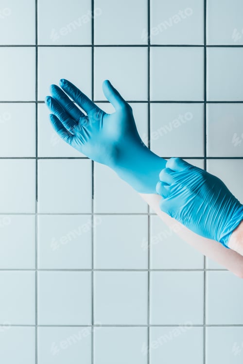 Preview: Blue Glove Preparation Against White Tiled Background
