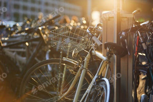 Preview: Public bicycle parking at city street at sunset light. Zurich, Switzerland.