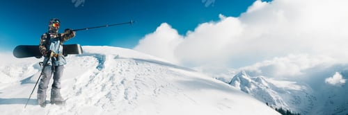 Preview: Snowboarder on Mountain Peak Wide Banner with Copy Space