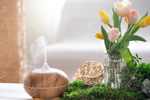 Preview: Aroma oil diffuser lamp on the table .