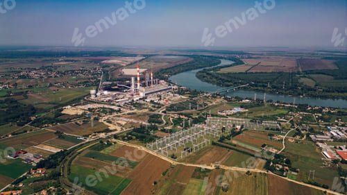 Preview: Areal drone footage of a power plant in a small town