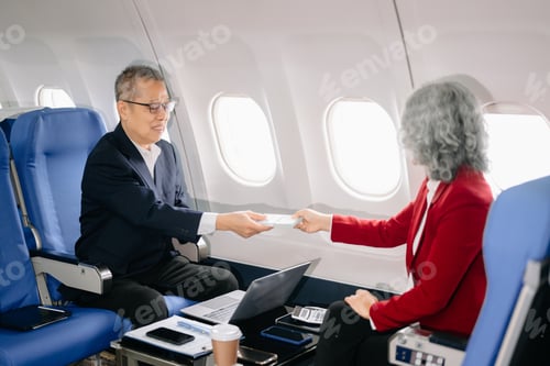 Preview: Business meeting in airplane, asian Mature businean in private jet is talking