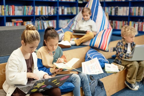 Preview: Children in Library Girls using Computer
