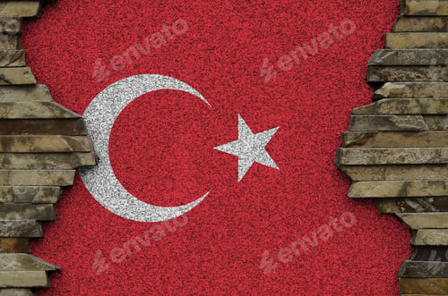Preview: Turkey flag depicted in paint colors on old stone wall close up