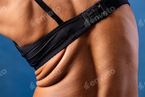 Preview: Rear view of a woman wearing a black bra
